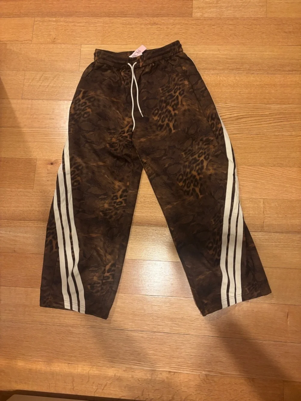 Brand New women’s Brown Leopard Print Track Pants with White Side Stripes - Picture 1 of 3